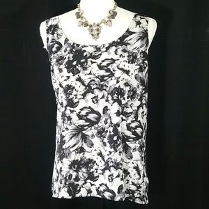 Express sleeveless floral pattern top. Size L